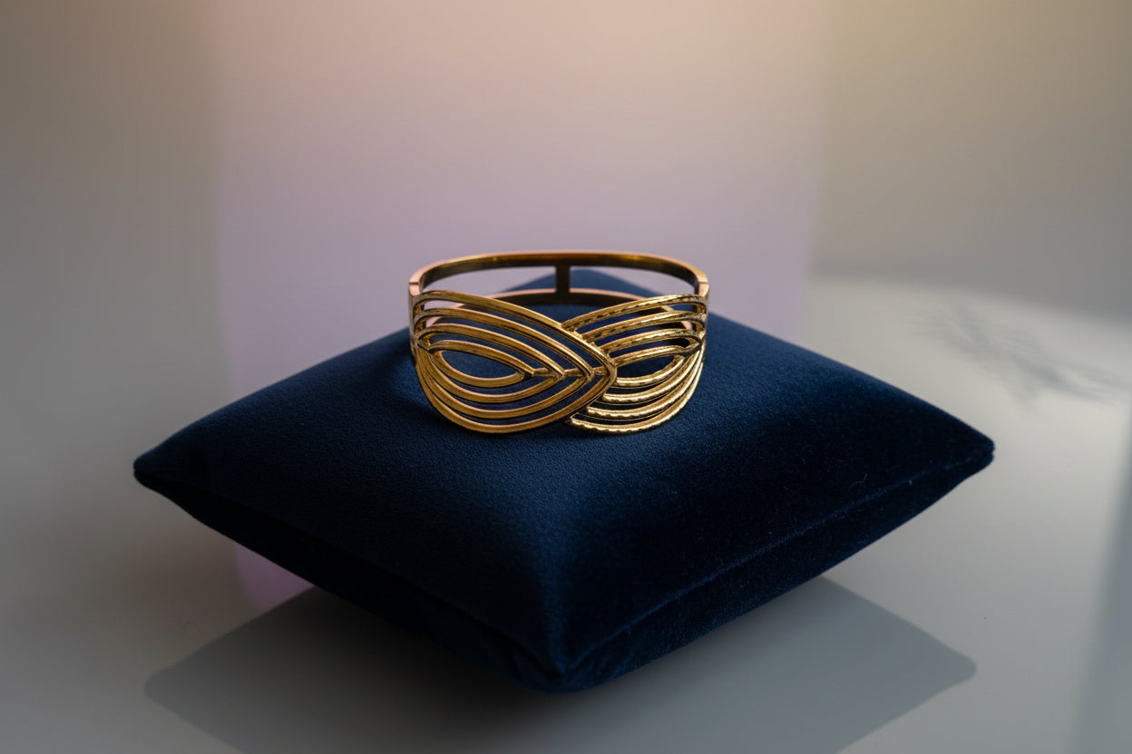 BRACCIALE IN METALLO DORATO CON DISEGNO FOGLIA
