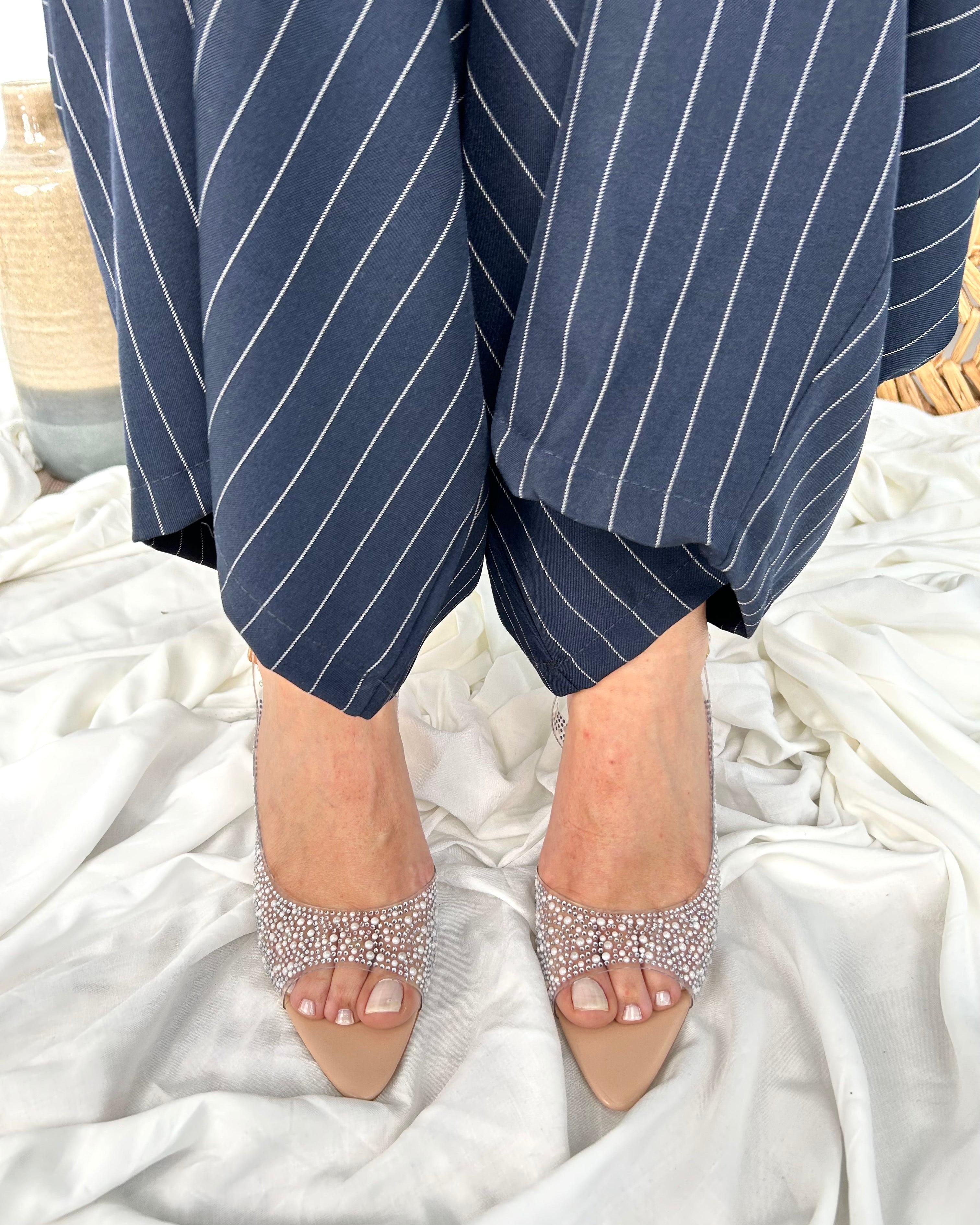 SLINGBACK TRASPARENTE CON DETTAGLI STRASS TONO SU TONO PUNTA AFFUSOLATA COL.NUDE