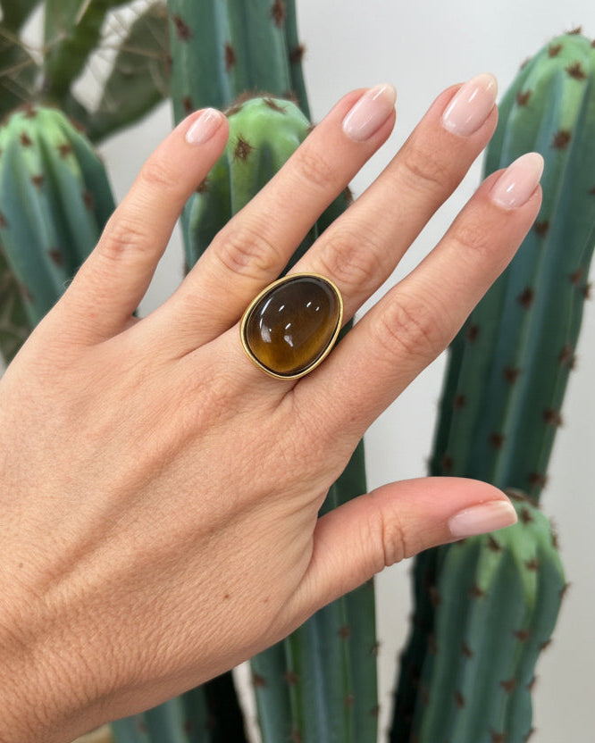 ANELLO CON GEMMA OVALE SCURA