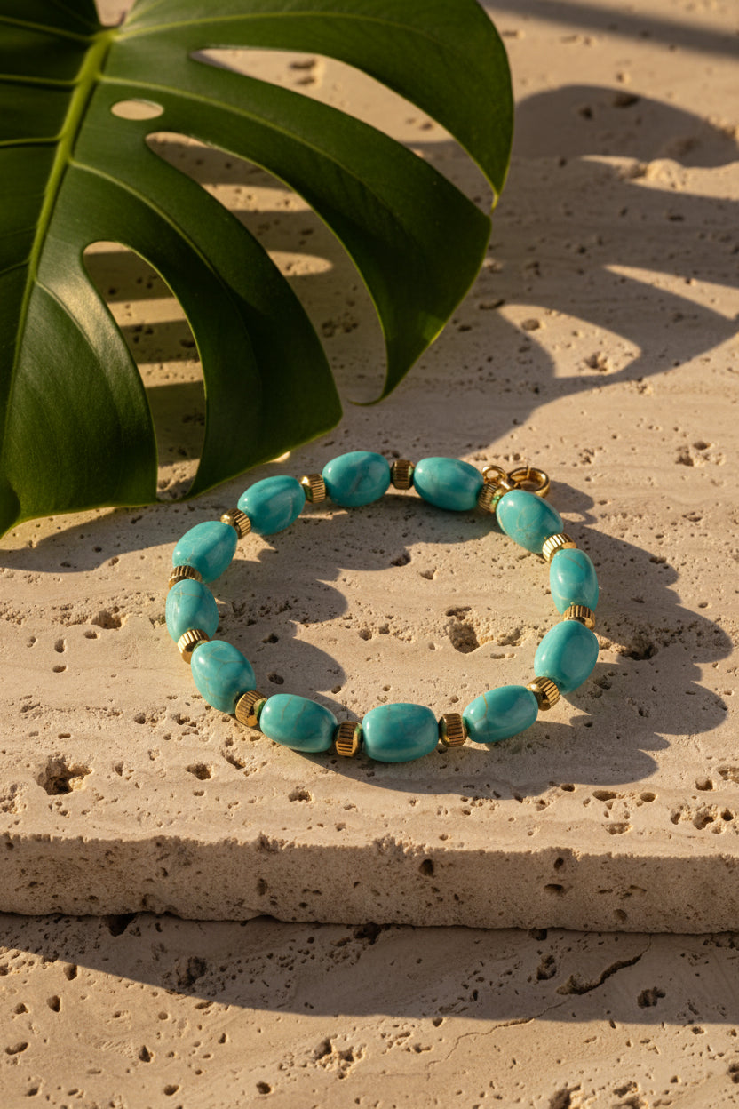 BRACCIALE TURCHESE CON PERLE IRREGOLARI E DISTANZIATORI ORO