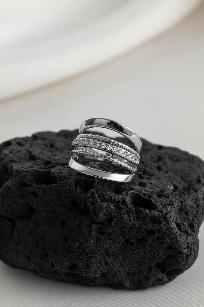 ANELLO MULTIBANDA CON PICCOLE PIETRE BRILLANTI COL. ARGENTO