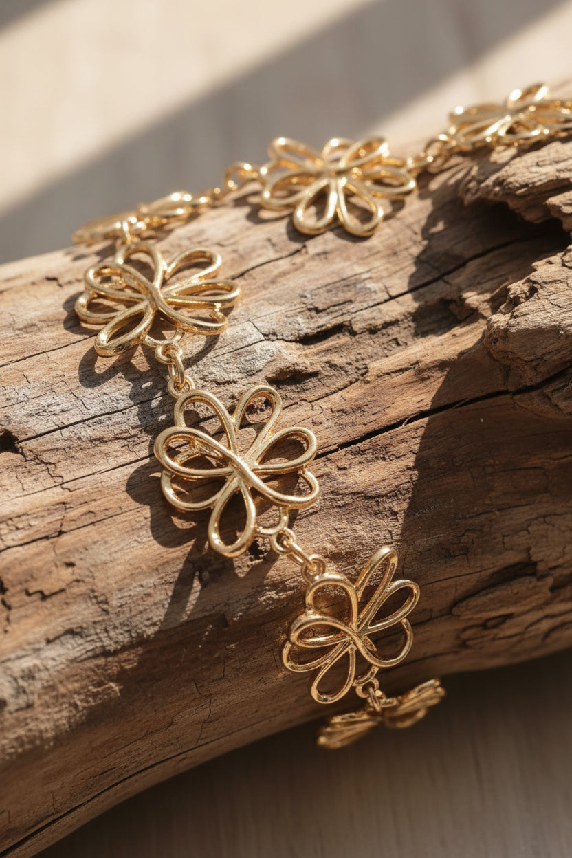 CINTURA GIOIELLO A FIORI INTRECCIATI ORO