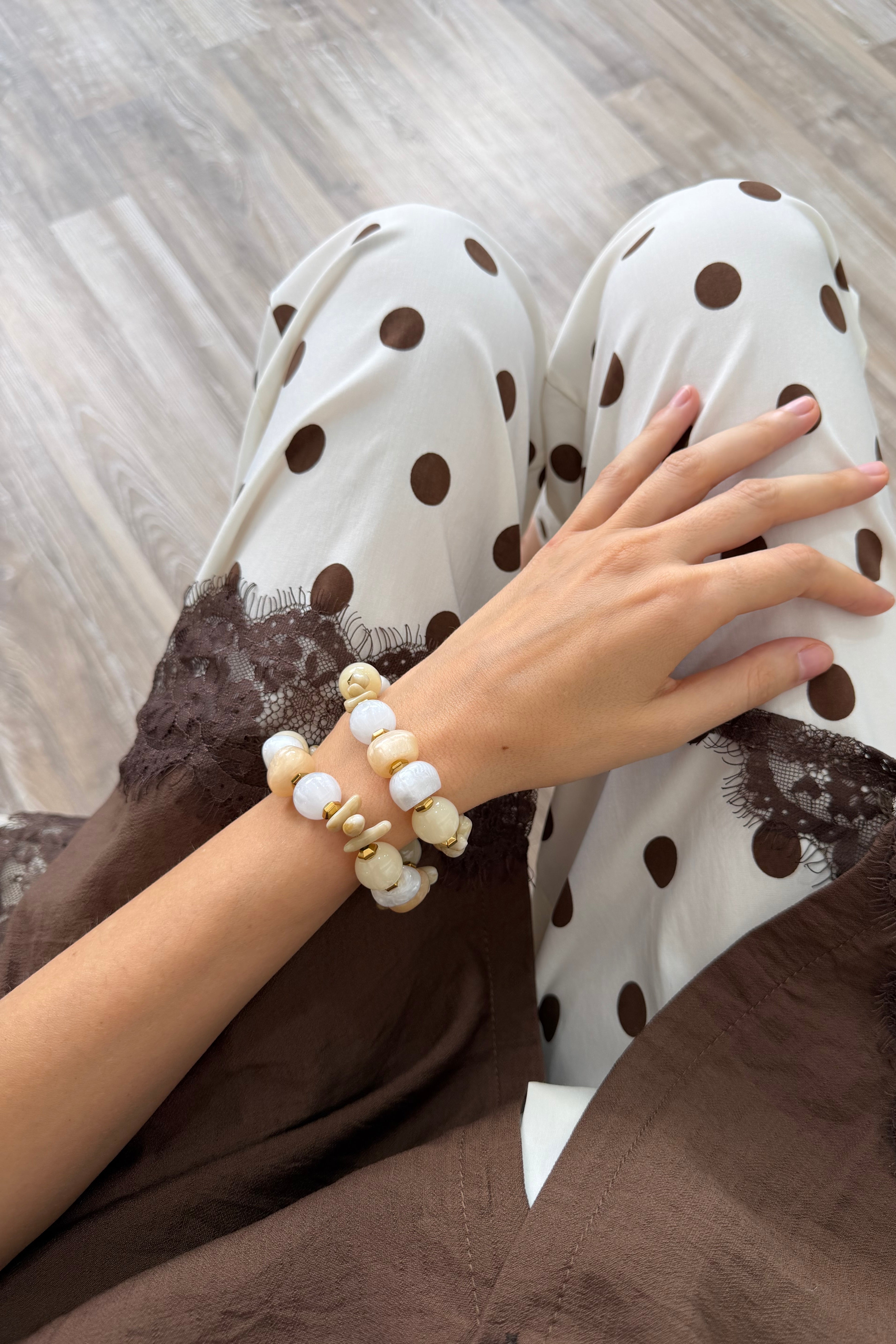 BRACCIALE NEUTRO CON PIETRE TONDE E ELEMENTI IRREGOLARI