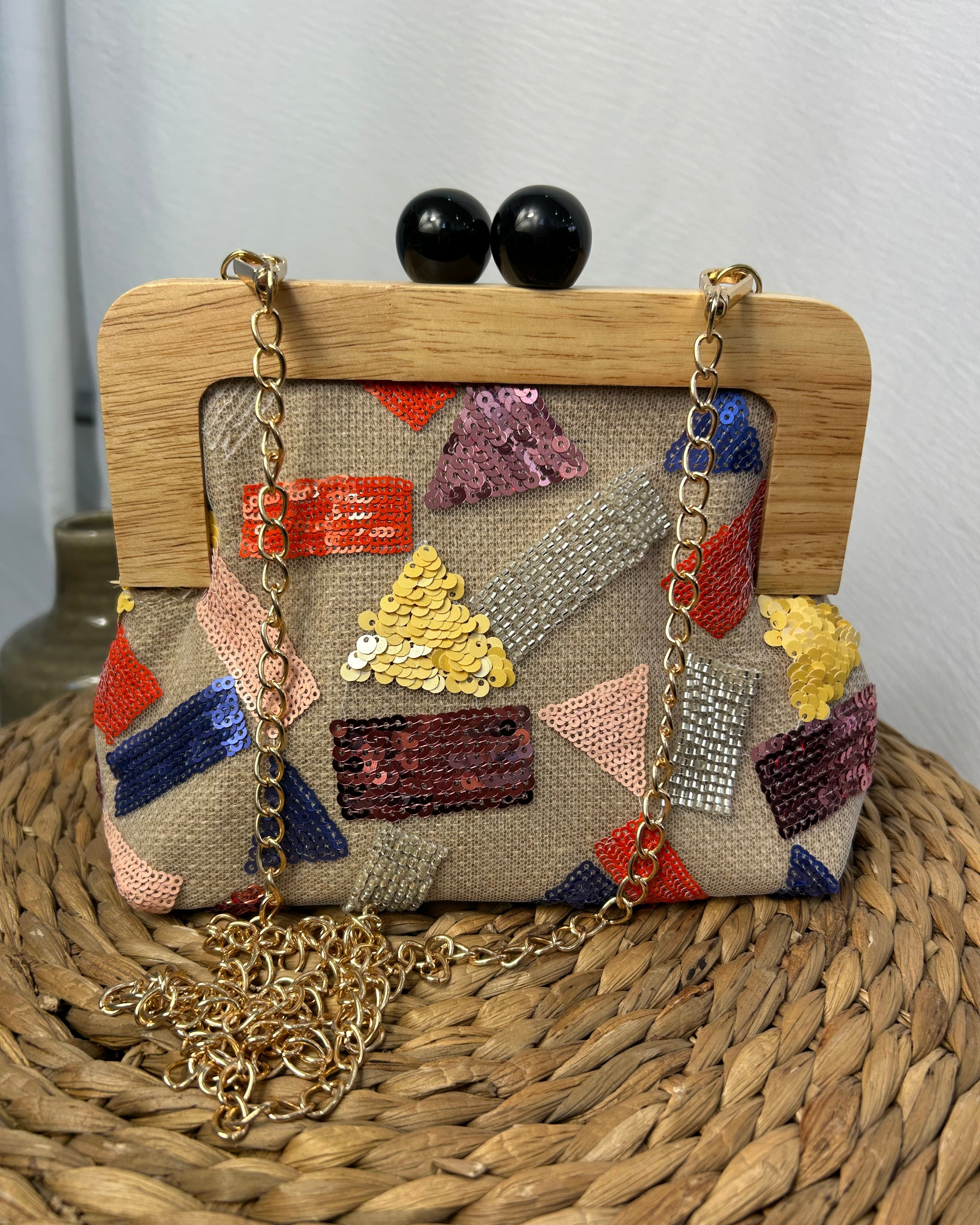 MINI BAG IN LINO CON APPLICAZIONI E RICAMI LUMINOSE