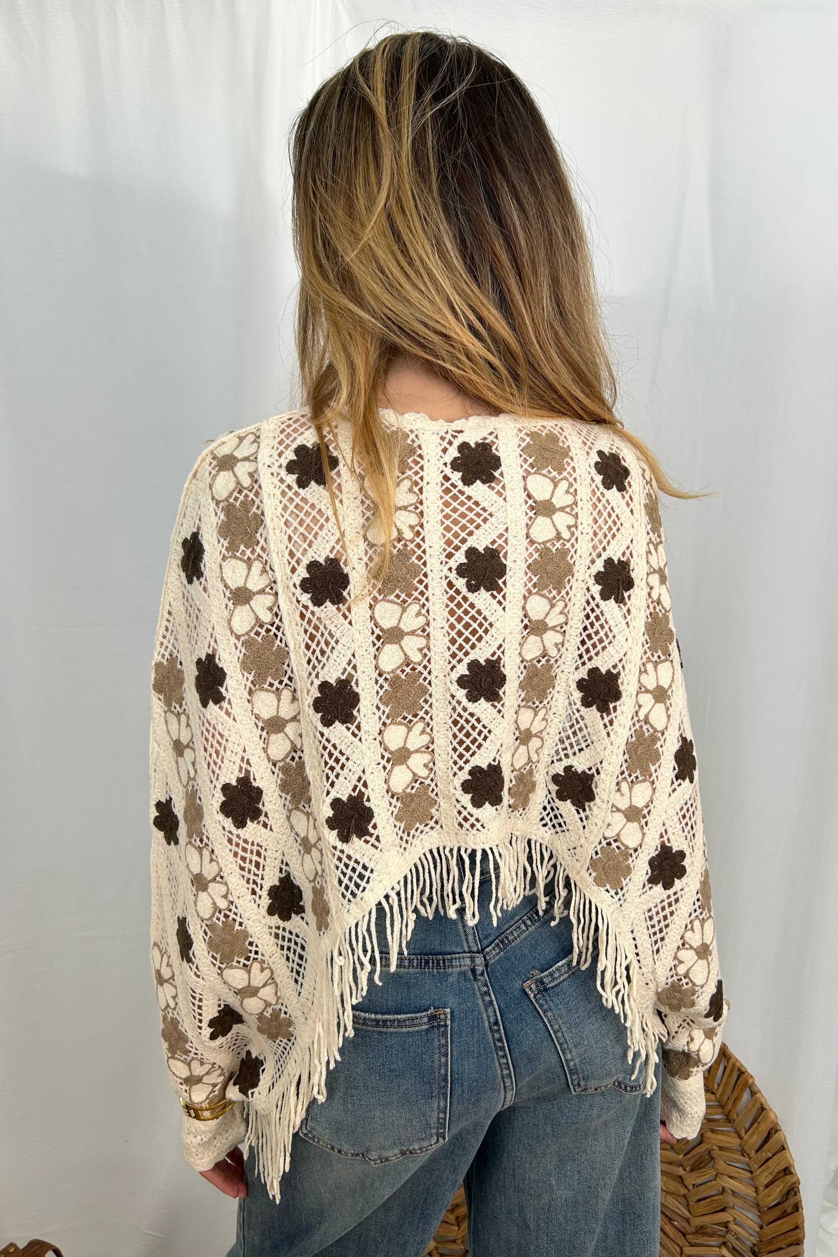 MAGLIA PONCHO TRAFORATA CON MOTIVI FLOREALI COL. NATURALE